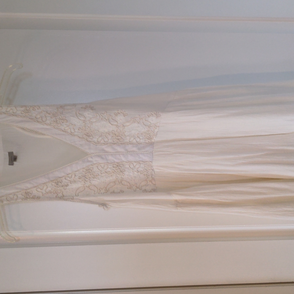 Urban Outfitters white beach cover up with embroidery. Size xs